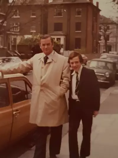 Phillip and his dad outside his grandmother&rsquo;s house in Swiss Cottage London, 1977.