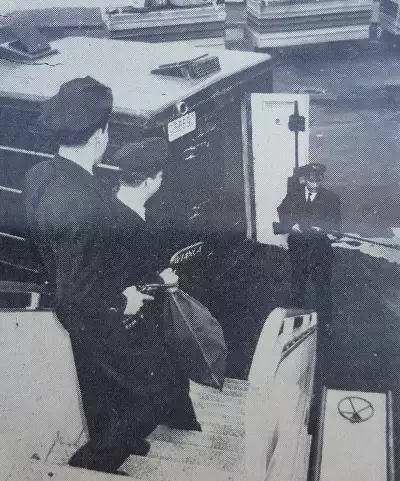 De La Rue guards offloading black sacks of cash at Bogota airport.