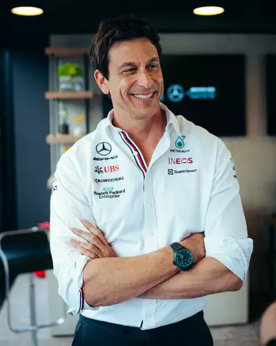 Toto Wolff poses with an IWC watch