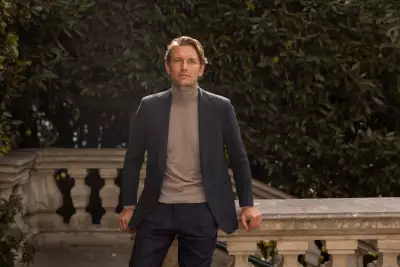 Luca Faloni camel beige pure cashmere roll neck, &pound;275; navy blue cashmere blazer, &pound;990; lucafloni.com