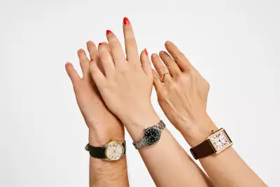 Luxury watches on wrists
