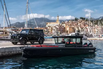 BRABUS Shadow 500 Cabin Black Ops Limited Edition 93 alongside Brabus G Class