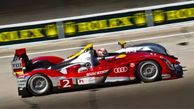 Nine-time Le Mans champion Tom Kristensen behind the wheel