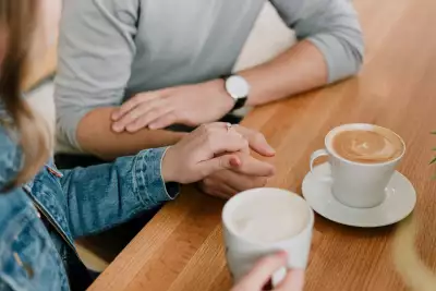 Couple holding hands