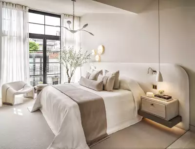 Kelly Hoppen showcases a calm, neutral scheme, softened with multiple lighting options and layered textures. Kelly Hoppen showcases a calm, neutral scheme, softened with multiple lighting options and layered textures.