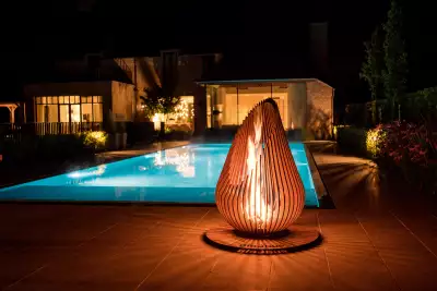 FIRE STARTER: the handmade Dewdrop fire pit from Glowbus creates a stunning sculptural focal point. FIRE STARTER: the handmade Dewdrop fire pit from Glowbus creates a stunning sculptural focal point.