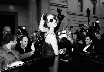 Lady Gaga, May 2011. “As she prepared to leave, she climbed onto the roof of her car and struck a playful pose for the screaming crowd.” Lady Gaga, May 2011. “As she prepared to leave, she climbed onto the roof of her car and struck a playful pose for the screaming crowd.”
