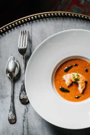 Tomato soup with basil and langoustines