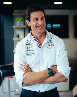 Toto Wolff poses with an IWC watch