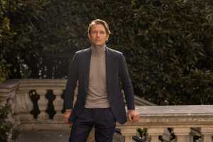 Luca Faloni camel beige pure cashmere roll neck, £275; navy blue cashmere blazer, £990; lucafloni.com