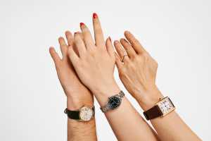 Luxury watches on wrists