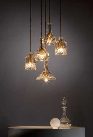 Lee Broom's Decanterlight Chandelier five piece with brushed brass pendants.