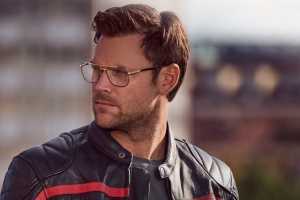 Model wearing Italian eyewear brand Carrera