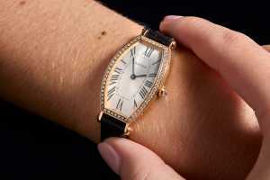 A Cartier Tonneau offered in the September auction at £7,000 - £9,000 A Cartier Tonneau offered in the September auction at £7,000 - £9,000