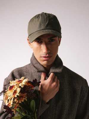Man wearing Stiksen cap Man wearing Stiksen cap