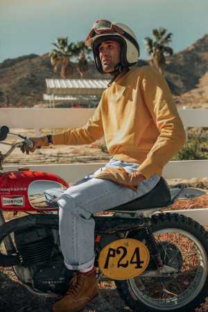 &SONS McQueen Sunracer Sweatshirt Yellow, £110; McQueen Bonner Jean Light Blue Wash, £220; andsons.co.uk