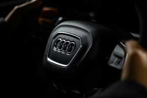 Owner behind the steering wheel of their new used Audi for the first time