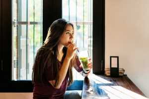 Woman drinking healthy shake