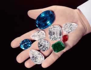 Mr Harry Winston's hand holding some of his most famous diamonds and gemstones Mr Harry Winston's hand holding some of his most famous diamonds and gemstones