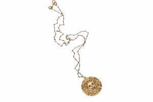 Will Turner&rsquo;s (Orlando Bloom) bloodied cursed Aztec medallion necklace from Pirates of the Caribbean: The Curse of the Black Pearl