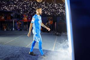 Brazilian superstar Neymar enters the pitch during his unveiling ceremony at Al-Hilal in Riyadh on August 19, 2023 as he becomes the latest world-famous footballer snapped up by the big-spending Saudi Pro League.