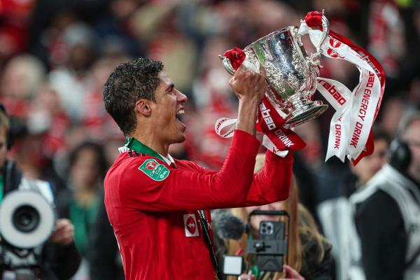 Raphael Varane of Manchester United celebrates with the trophy after the Carabao Cup Final between Manchester United and Newcastle United at Wembley Stadium, London on Sunday 26th February 2023. (Photo: Mark Fletcher | MI News)