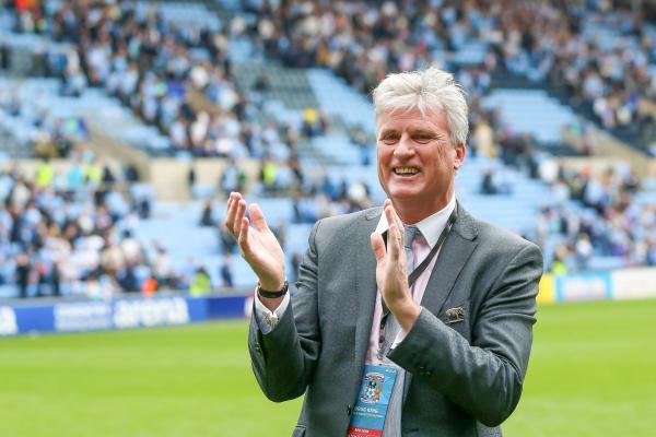 Coventry City owner Doug King applauds the fans.