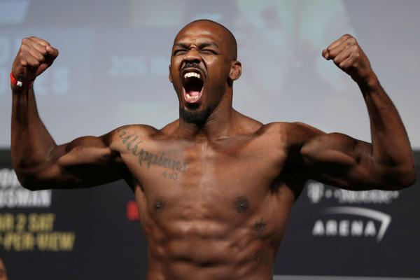 Jon Jones poses during the ceremonial UFC 235 mixed martial arts weigh-in event in Las Vegas, Friday, March 1, 2019