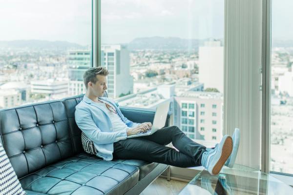 Man working on a laptop from home