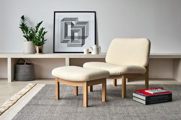 DAWN OF A NEW MID CENTURY: The Clore Lounge chair and Ottoman reference a 1960s private penthouse designed by Tamar de Shalit for Sir Charles Clore, shown here upholstered in cream Bute wool fabric.