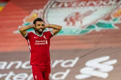 Liverpool's Mohamed Salah celebrates scoring a goal during the English Premier League match between Liverpool FC and Leeds United FC at Anfield in Liverpool, Britain, Sept. 12, 2020. Credit: Xinhua/Alamy Live News - Image ID: 2CGX9X4