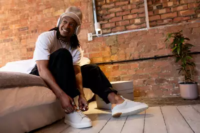 Model wearing Vyn sneakers