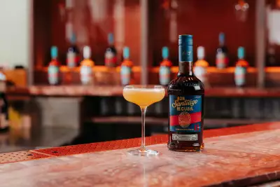 Ron Santiago de Cuba bottle and cocktail