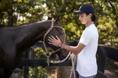 Polo player Poroto Cambiaso riding his stable of polo horses