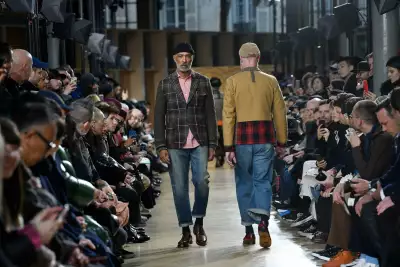 Models present creations from Junya Watanabe during Paris Men's Fashion Week