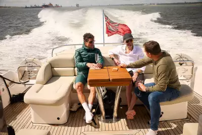 Men sitting on the back of a Sunseeker