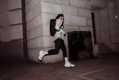 Runners wearing Stolt commuter backpacks