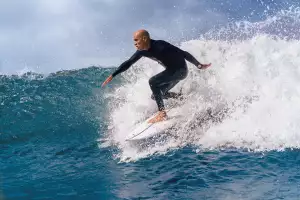 Kelly Slater riding the waves wearing a Breitling Superocean 'Kelly Slater' Kelly Slater riding the waves wearing a Breitling Superocean 'Kelly Slater'