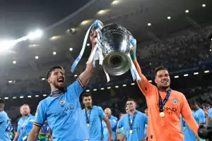 Istanbul, Turkey. 10th June, 2023. Ruben Dias (3) and goalkeeper Ederson (31) of Manchester City seen celebrating as the winners of the UEFA Champions League final between Manchester City and Inter Milan at the Ataturk Stadium in Istanbul. (Photo Credit:
