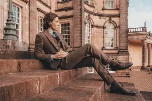 Model wearing Walker Slater tweed suit