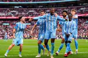 Coventry City's Haji Wright (centre) celebrates after scoring their side's third goal of the game from the penalty spot during the Emirates FA Cup semi-final match at Wembley Stadium. Coventry City's Haji Wright (centre) celebrates after scoring their side's third goal of the game from the penalty spot during the Emirates FA Cup semi-final match at Wembley Stadium.