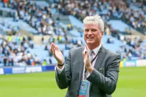 Coventry City owner Doug King applauds the fans.