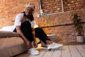 Model wearing Vyn sneakers