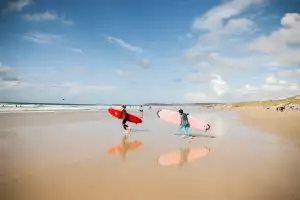 Surfers on a Cornish beach Surfers on a Cornish beach