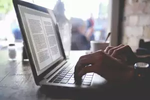 Person working on a laptop