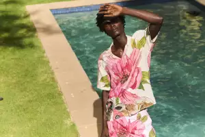Model wearing Orelbar Brown