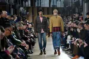Models present creations from Junya Watanabe during Paris Men's Fashion Week