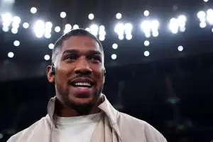 Anthony Joshua attends the heavyweight bout between Tyson Fury and Arslanbek Makhmudov at Tottenham Hotspur Stadium, London