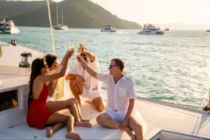 People enjoying a drink onboard a yacht