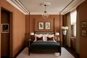 Albion Nord keeps colour choices contemporary, using clay tones from floor to cornice to warm up the bedroom at the OWO.